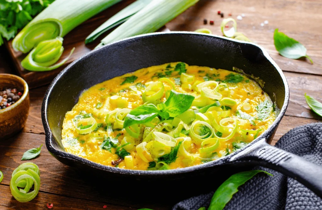 Chopped vegetables, including bell peppers and onions, prepared for a delicious omelette with cheese and vegetables.