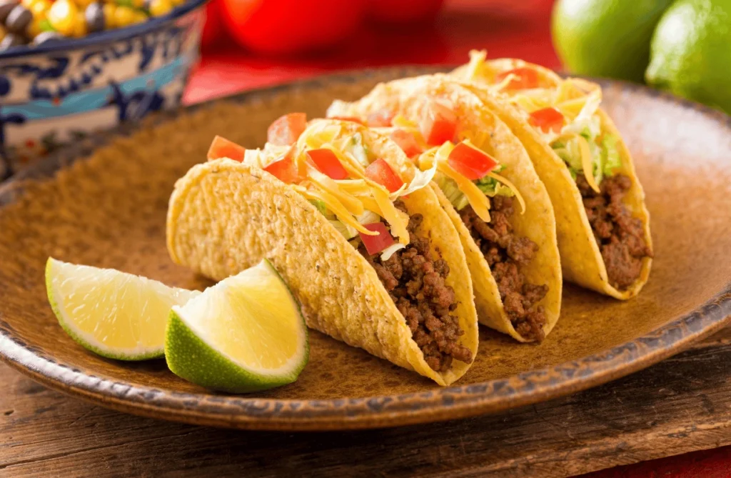 A freshly made Cheesy Gordita Crunch with a crispy taco shell, melted cheese, and a soft tortilla wrap.